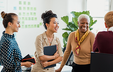 group-of-diverse-people-in-talking-in-office DEI Recruitment and retention image